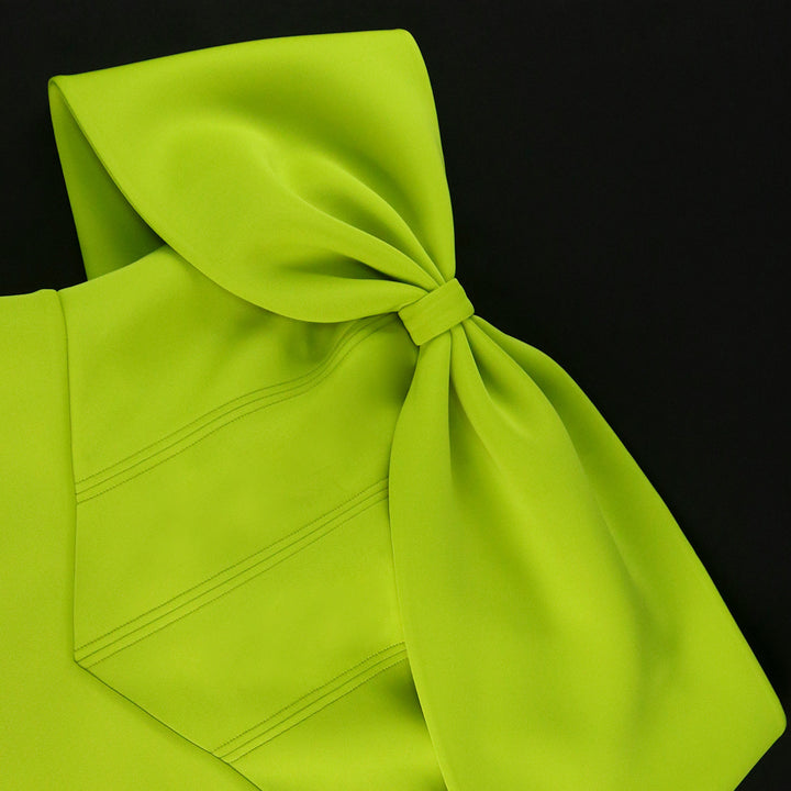 Women's elegant mini dress with asymmetric cut and voluminous overlay StylebySassy