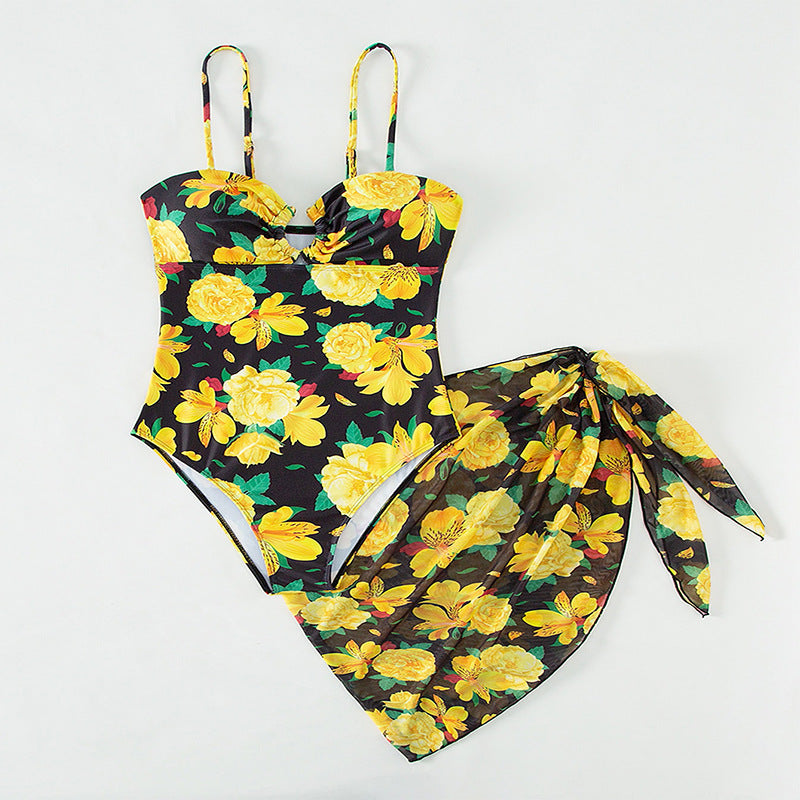 Women's one-piece swimsuit with floral design and matching overlay skirt StylebySassy