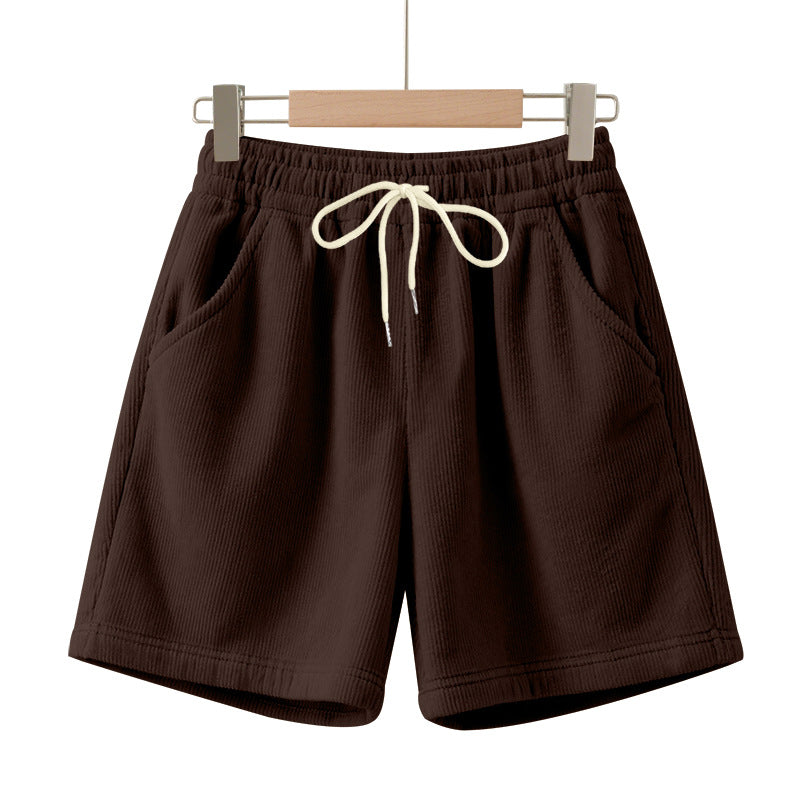Men's ribbed jersey shorts with elastic waistband, decorative drawstring, and side slant pockets StylebySassy
