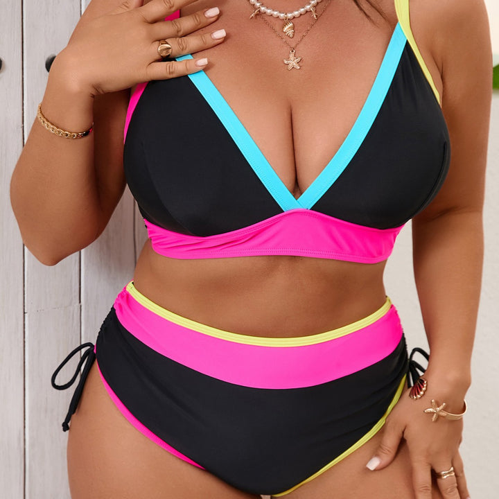 Women's sporty bikini set with high-waisted bottoms and trendy color contrast StylebySassy