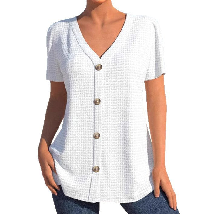 Women's finely structured V-neck top with decorative button placket and slightly flared silhouette StylebySassy