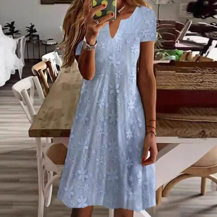 Women's knee-length A-line dress made of cotton blend with embroidered broderie overlay, short sleeves and V-neck StylebySassy