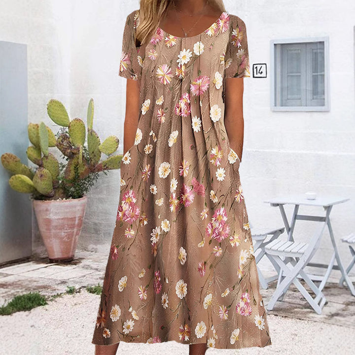Women's nan Blumenswing midi dress with round neckline, inset pockets, and structured crepe quality StylebySassy