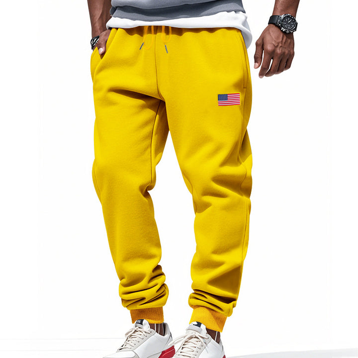 Men's slim-fit sweatpants with tapered leg, elastic drawstring waistband, and discreet flag application StylebySassy