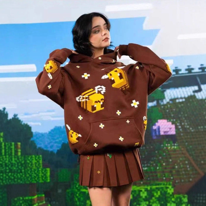 Unisex hoodie with woven pixel bee motif and attached kangaroo pocket StylebySassy