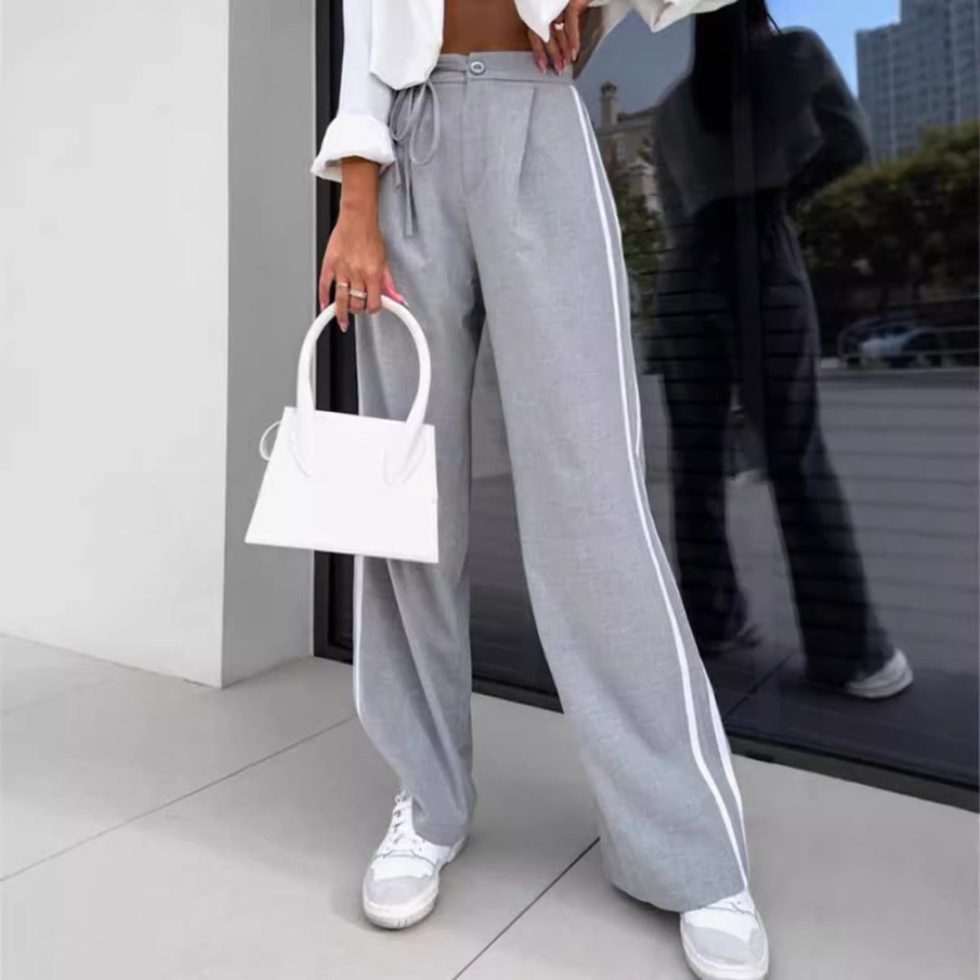 Women high-waisted wide leisure pants with sporty side stripe and tie belt StylebySassy