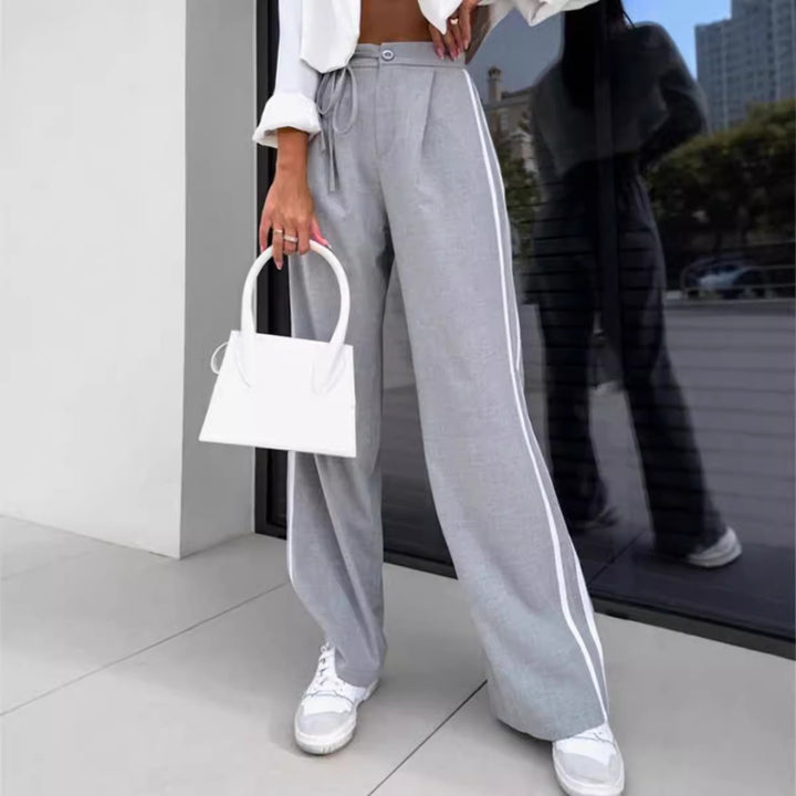 Women high-waisted wide leisure pants with sporty side stripe and tie belt StylebySassy