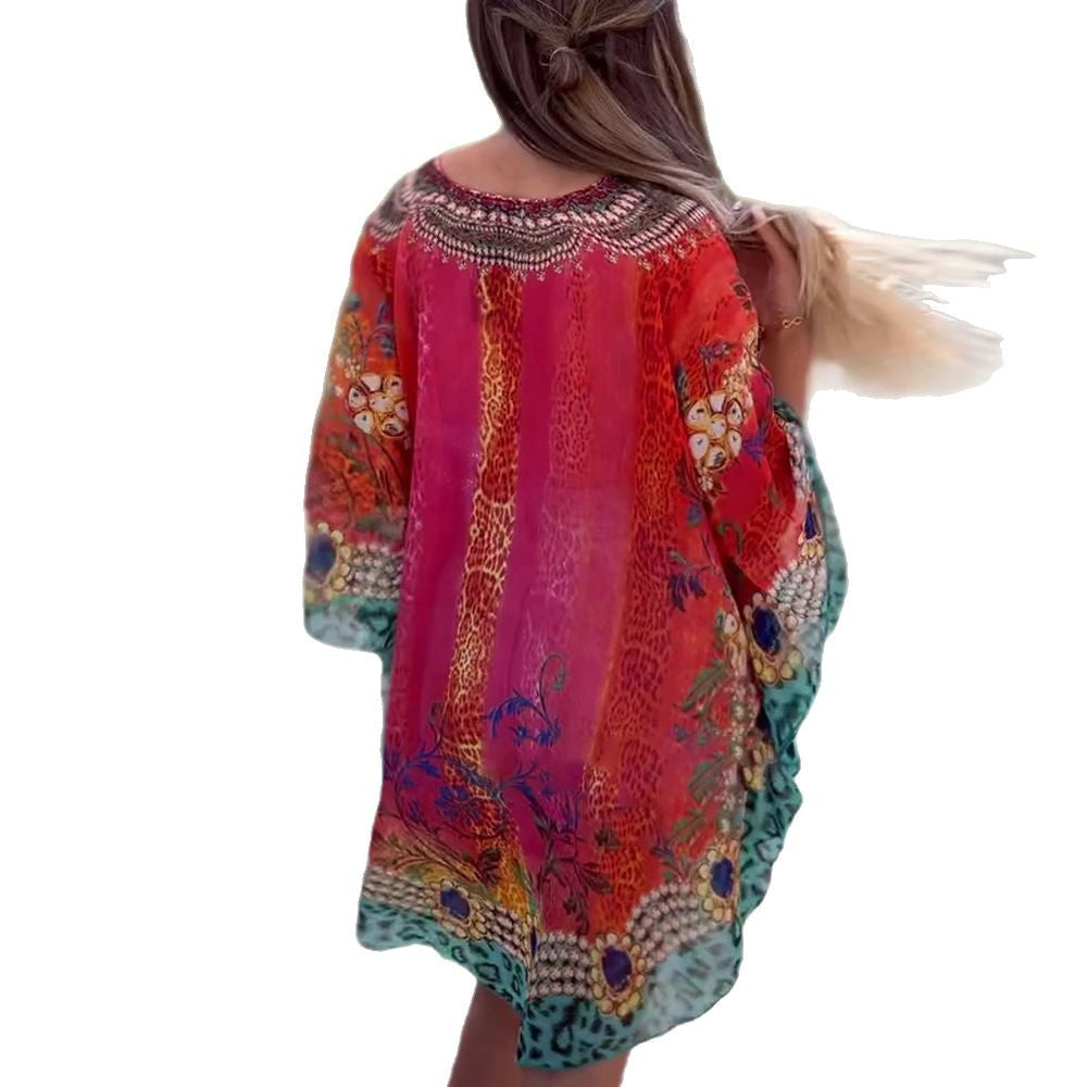 Women's short tunic kaftan with embellished V-neck and floral-animal border StylebySassy