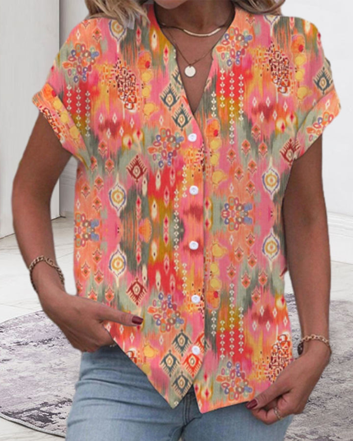 Women's casual short-sleeve blouse with V-neck, button placket and folk all-over print StylebySassy