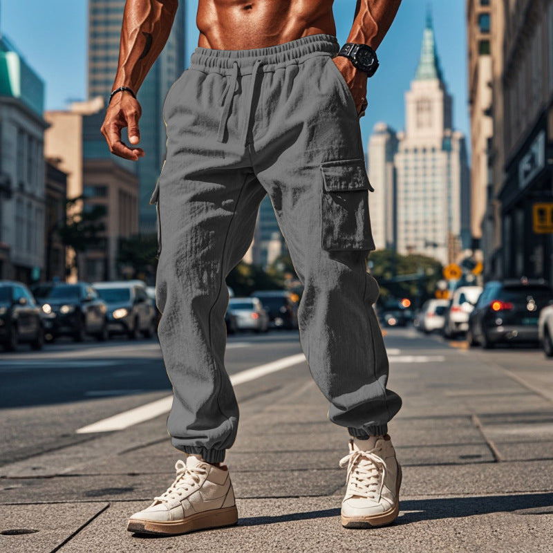 Men's sporty work-inspired joggers with patch flap pockets, elastic drawstring waistband, and gathered leg cuffs StylebySassy