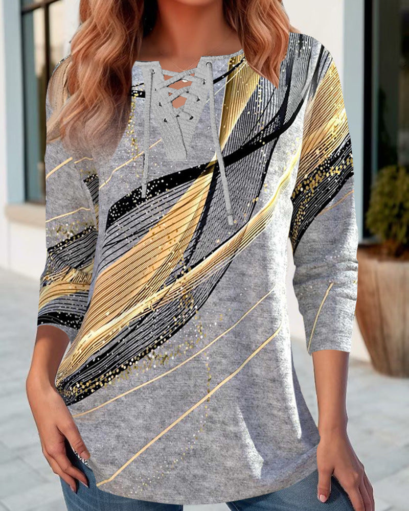 Women's long shirt with lace-up collar, three-quarter sleeves, and graphic metallic print StylebySassy