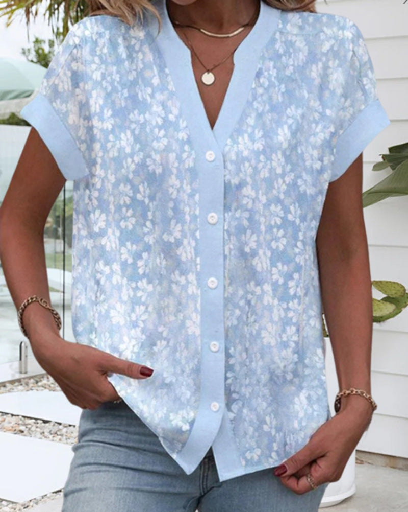 Women's airy button blouse with V-neck, rolled sleeves and floral textured print StylebySassy