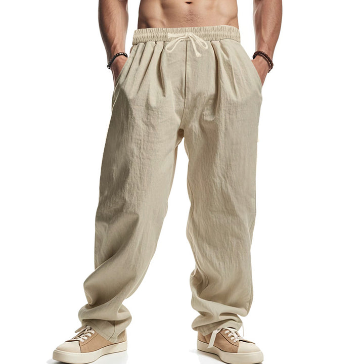 Men's loose leisure pants with elastic waistband, drawstring, and deep side pockets StylebySassy