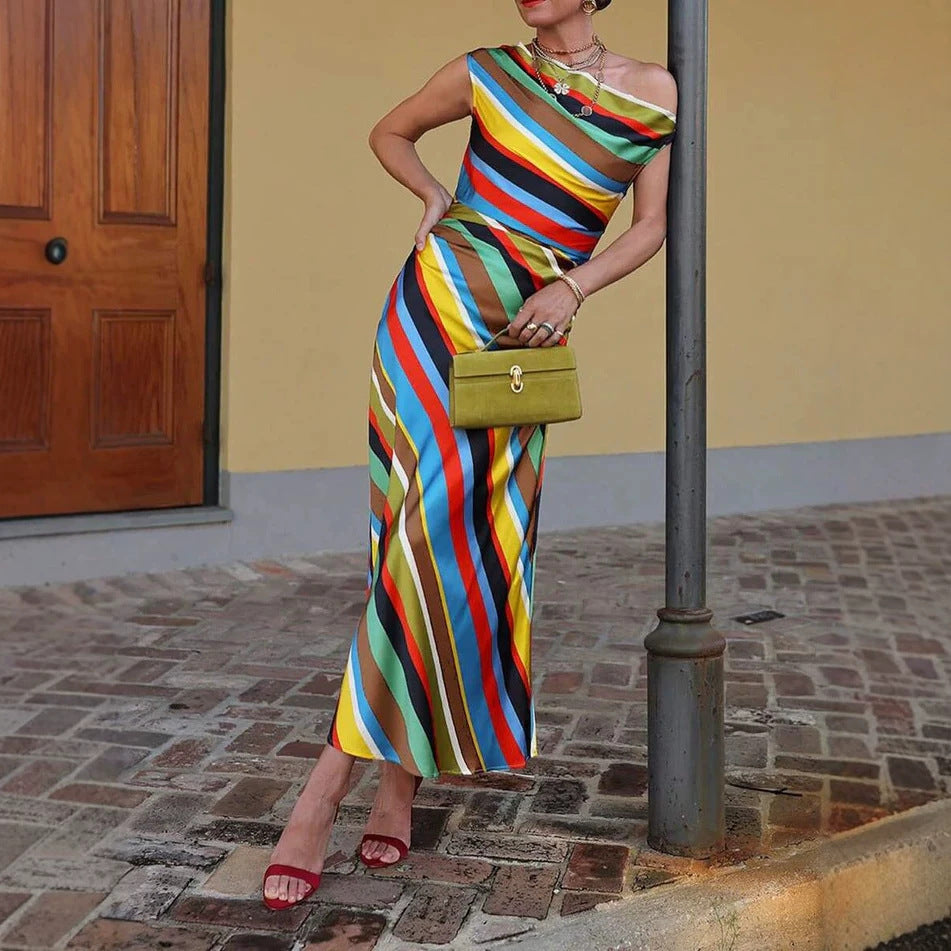Women's asymmetrical off-shoulder maxi dress with diagonal stripe pattern and fitted silhouette StylebySassy