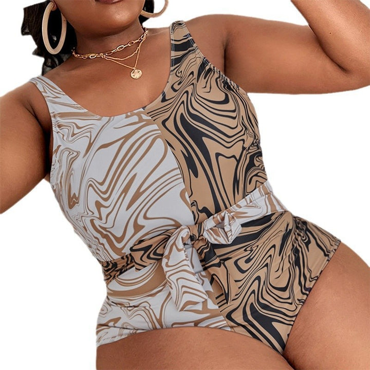 Women’s one-piece swimsuit with modern marble pattern and stylish waist belt StylebySassy