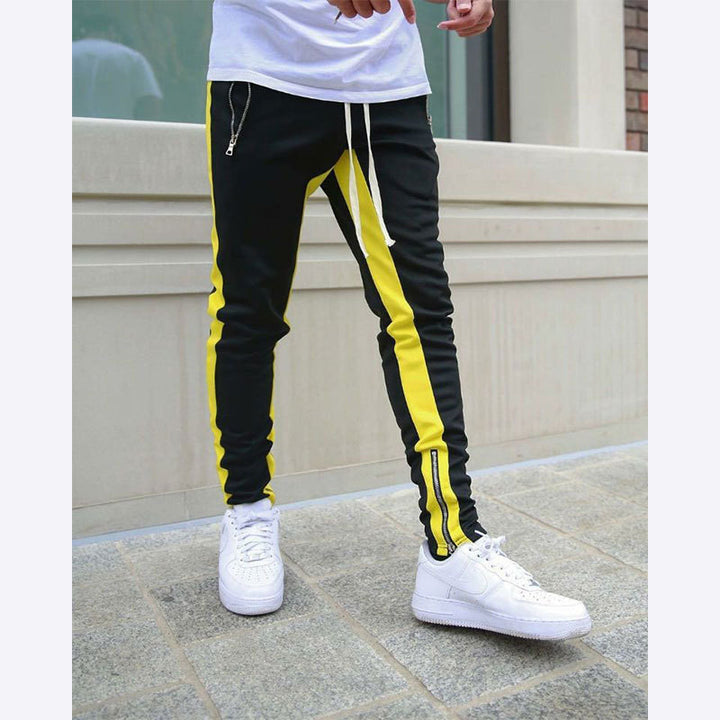 Men's narrow jogging pants with side contrast stripe, drawstring and ankle zipper StylebySassy