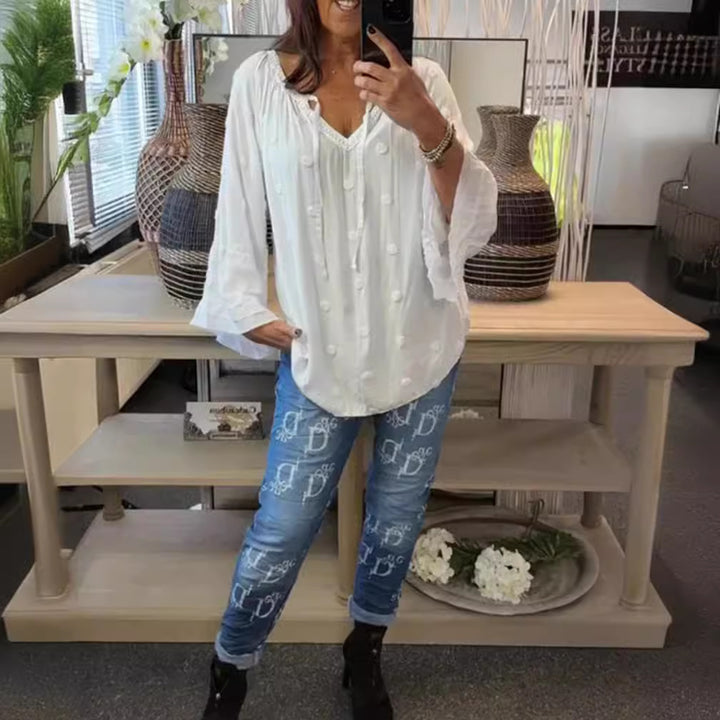 Women's lightweight Boho tunic with V-neck, three-dimensional dot texture and ruffle bell sleeves StylebySassy