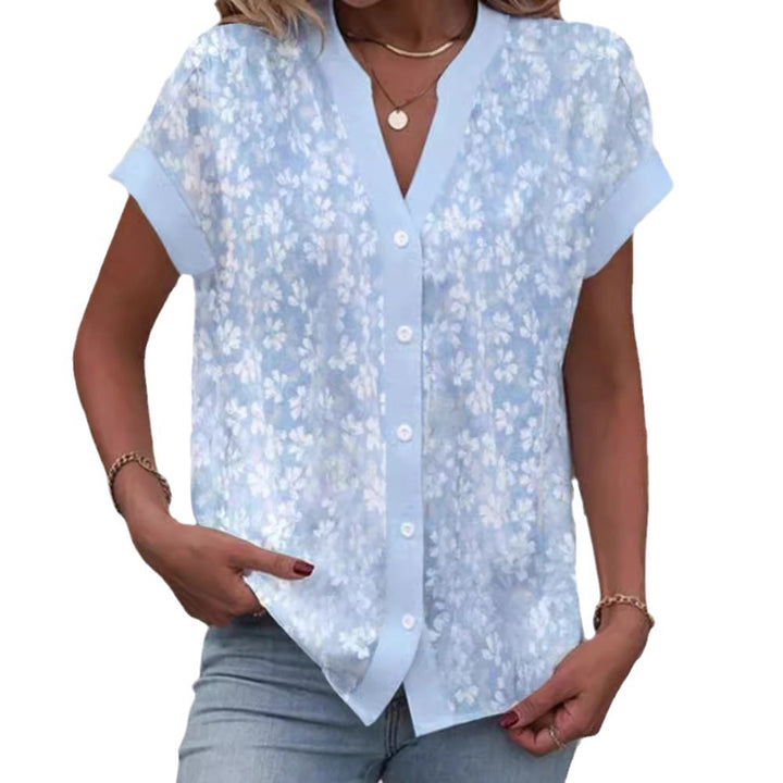 Women's airy button blouse with V-neck, rolled sleeves and floral textured print StylebySassy