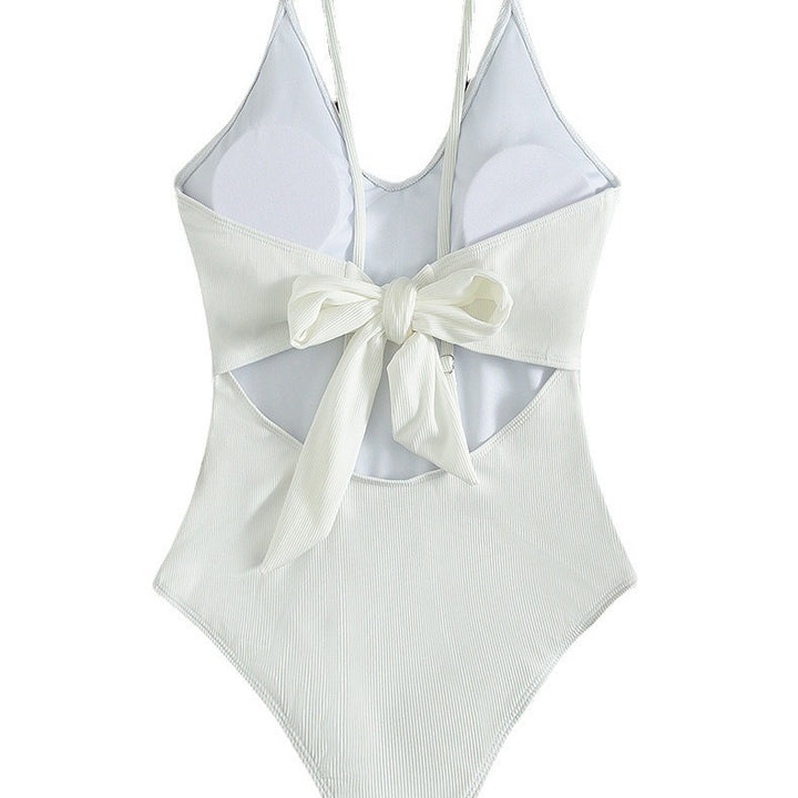 Women's one-piece swimsuit with deep V-neckline and fine ribbed texture StylebySassy
