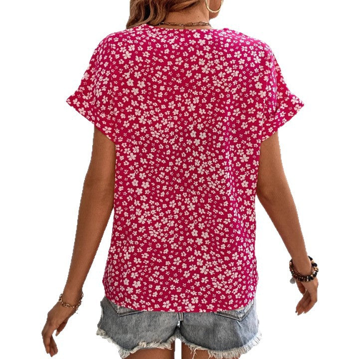 Women's lightweight viscose short sleeve blouse with V-neck, heart decorative button placket and casual hip length StylebySassy