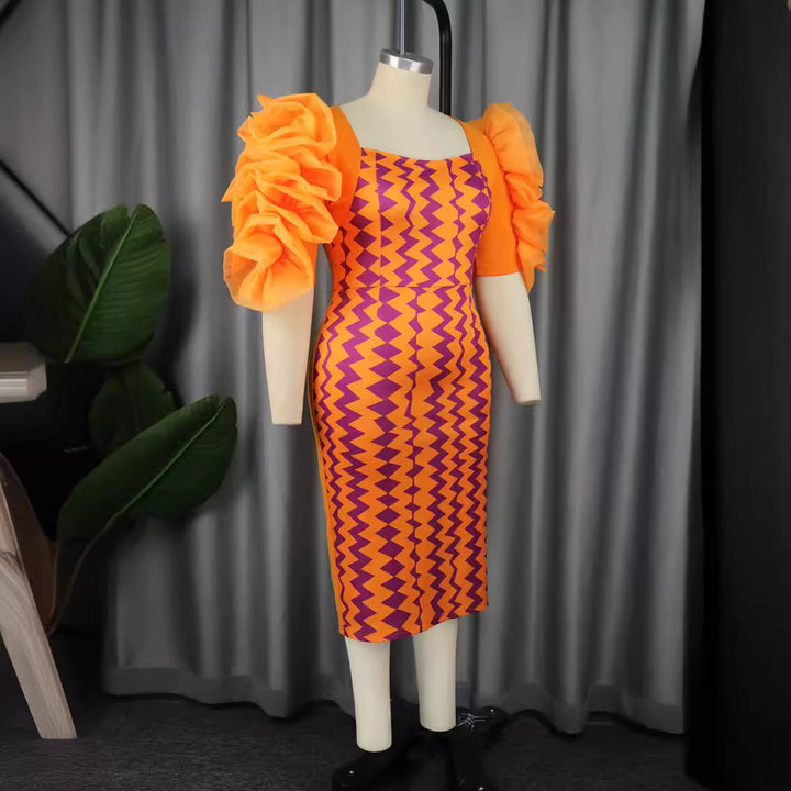 Women's fitted dress with striking ruffle sleeves and geometric pattern StylebySassy