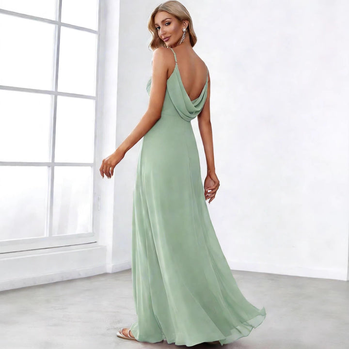 Ladies flowing chiffon evening dress with crossed draping, empire waist and fine spaghetti straps StylebySassy
