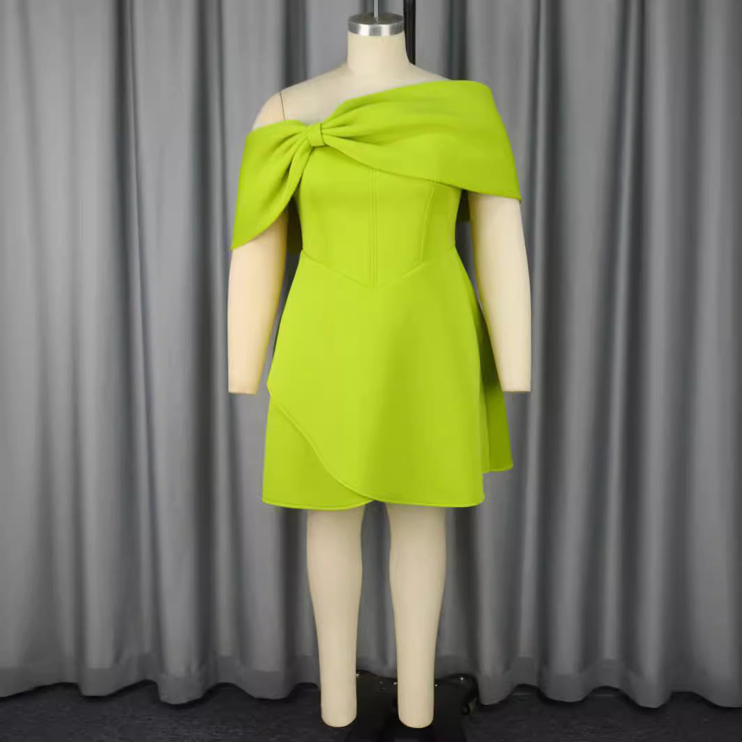 Women's elegant mini dress with asymmetric cut and voluminous overlay StylebySassy