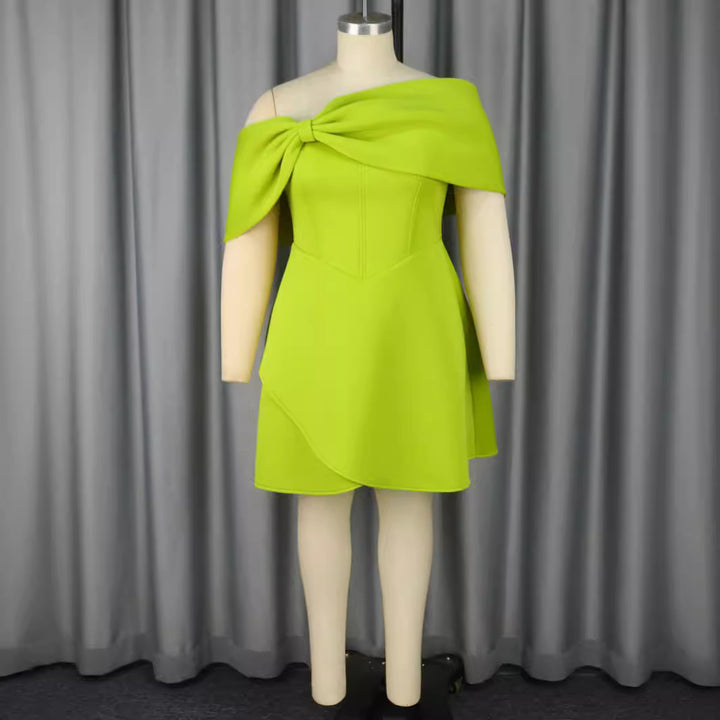 Women's elegant mini dress with asymmetric cut and voluminous overlay StylebySassy
