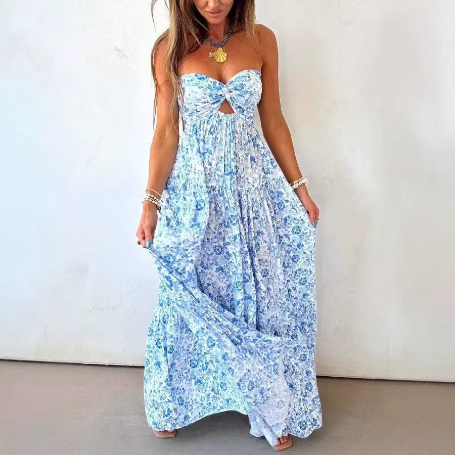 Ladies' strapless twisted bustier maxi dress with cut-out and multi-layered tiered skirt in lightweight crinkle quality StylebySassy