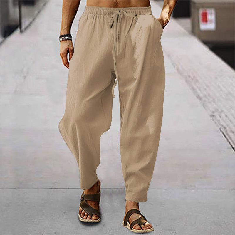 Men's relaxed summer slouch pants made of linen blend with elastic waistband and tapered ankle cuffs StylebySassy