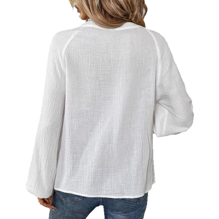 Women's casual cotton gauze blouse with embroidered V-neck, paisley embroidery, raglan seams, and wide balloon sleeves StylebySassy