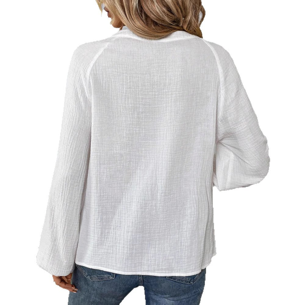 Women's embroidered cotton gauze tunic blouse with ornamental V-neck embroidery and trumpet sleeves StylebySassy
