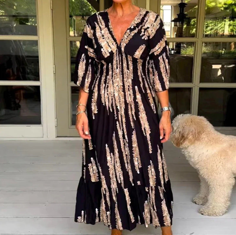 Ladies' V-neck maxi dress with brushstroke pattern, gathered underbust, balloon sleeves, and ruffled tiers StylebySassy