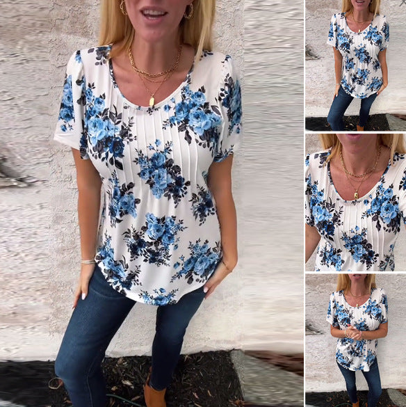 Women's short-sleeve blouse with box pleats, round neckline and floral all-over print StylebySassy