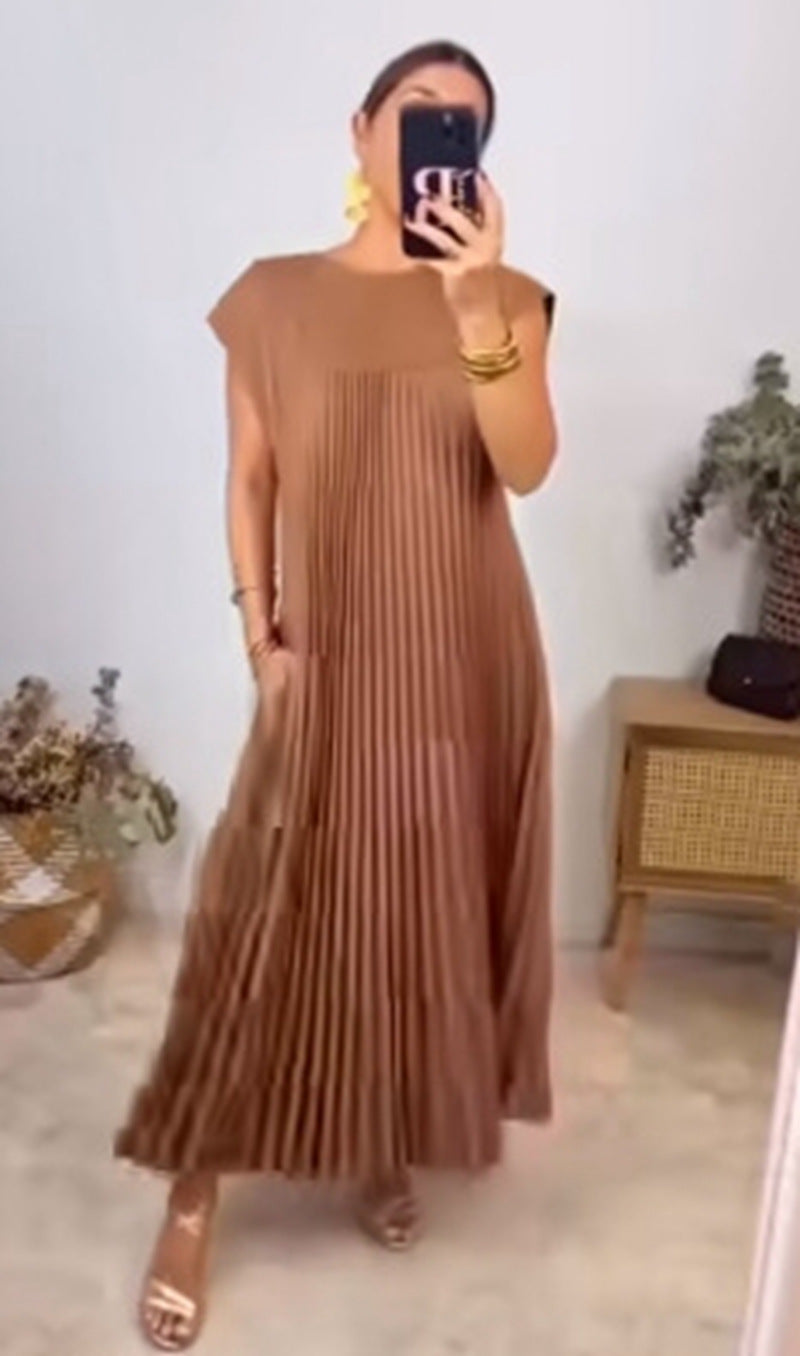 Women's flowing pleated maxi dress with dropped shoulders and side pockets StylebySassy