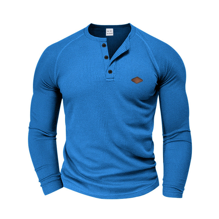 Men's structured waffle Henley shirt with short button placket, raglan sleeves, and leather patch StylebySassy