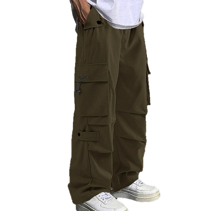 Men's baggy cargo pants with utilitarian flap pockets, drawstring waistband, and reinforced seams StylebySassy