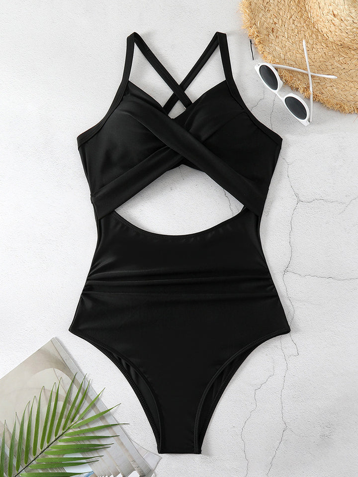 Women's one-piece swimsuit with stylish wrap design and sophisticated cross straps StylebySassy