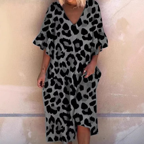 Ladies' casual midi dress in tunic style with V-neck, ruffled sleeves, and side pockets StylebySassy