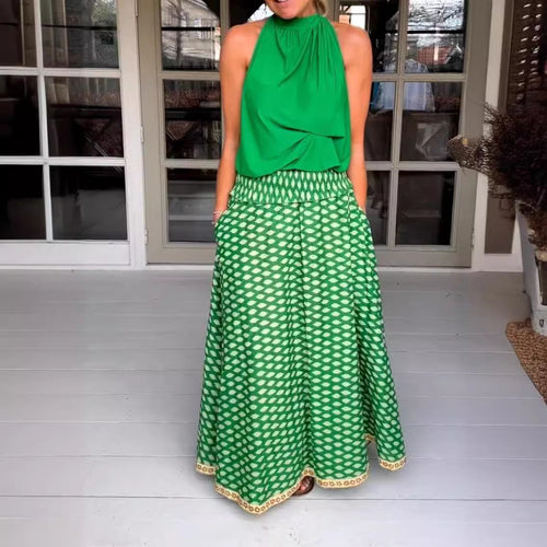 Women's two-piece halter neck set with gathered stand collar and patterned maxi skirt with elastic smocked waistband StylebySassy