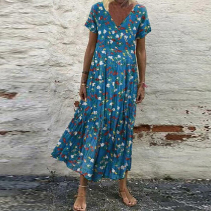 Women’s V-neck maxi dress with fine pleated skirt, empire bodice and short sleeves StylebySassy