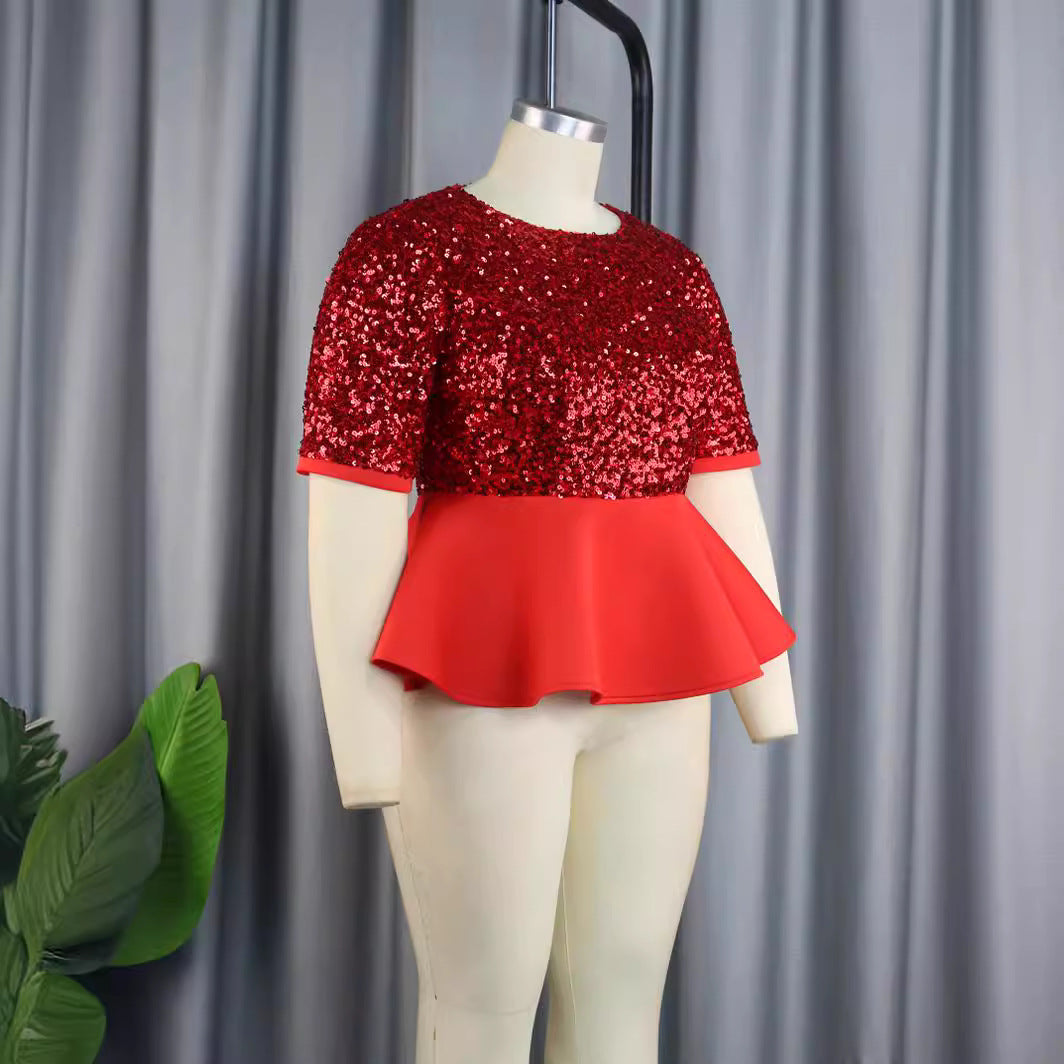 Ladies elegant glitter top with swinging peplum