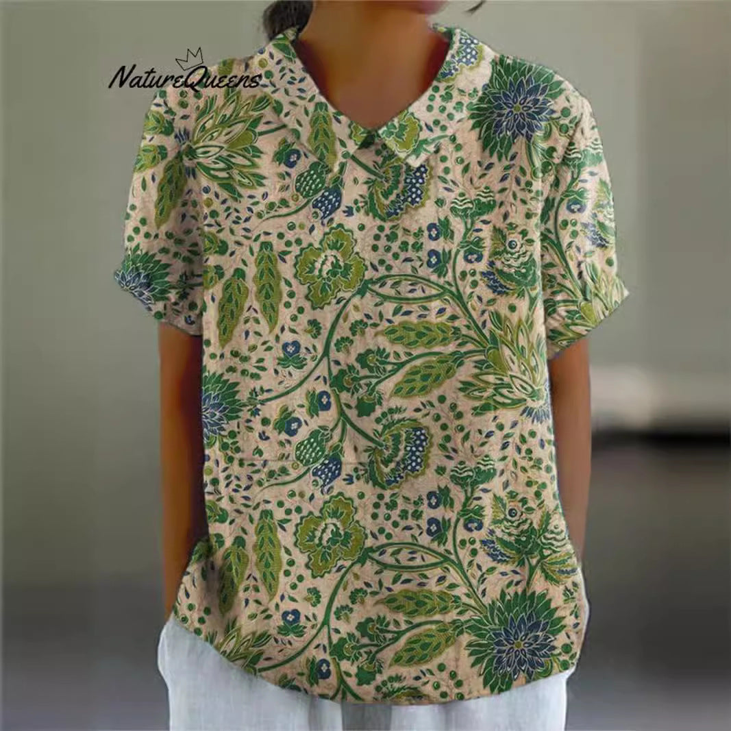 Women's casual short-sleeve blouse with V-neck, rounded hem, and botanical all-over print StylebySassy