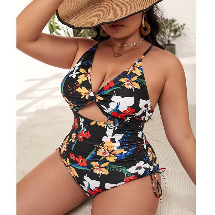 Women's one-piece swimsuit with trendy cut-out and colorful geometric design StylebySassy