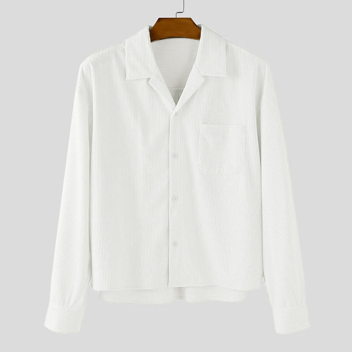 Men's ribbed long sleeve shirt with lapel collar, chest pocket, and relaxed fit StylebySassy