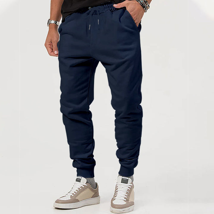 Men's jersey sweatpants in a tapered cut with concealed drawstring and shape-stable ankle cuffs StylebySassy