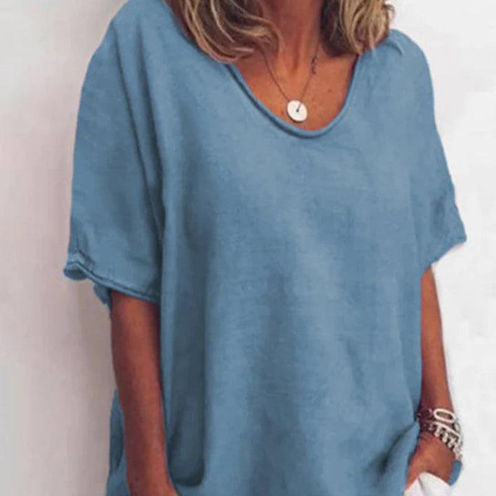 Women's loose linen blend tunic with dropped shoulder and rounded hem StylebySassy