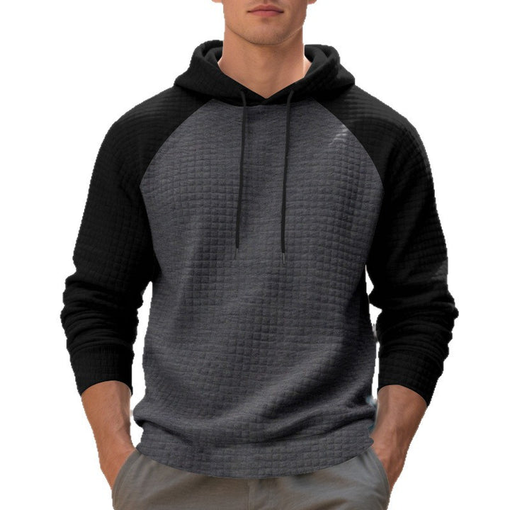 Men's quilted hoodie with raglan sleeves and drawstring StylebySassy