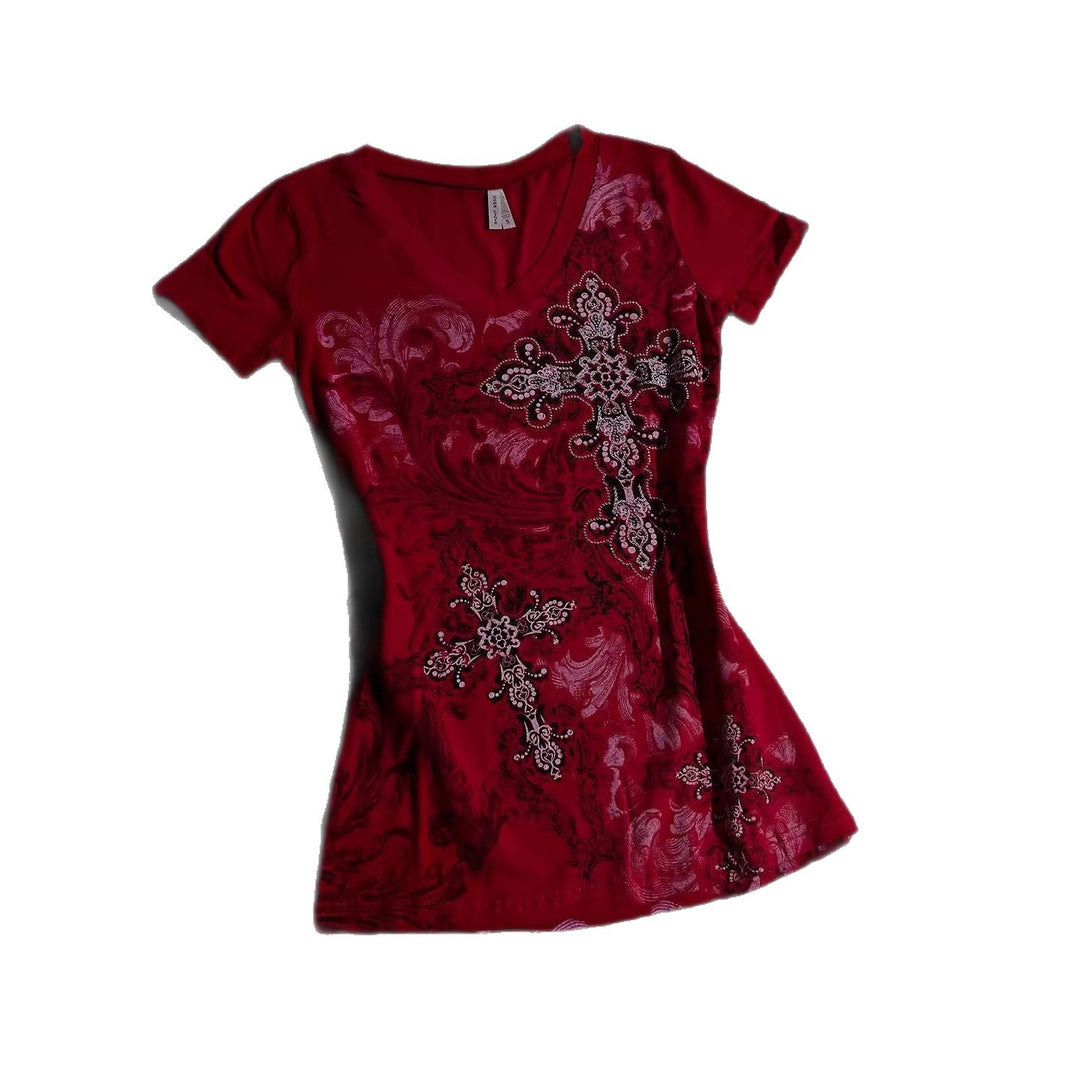 Women's T-shirt with decorative cross design and floral accents StylebySassy