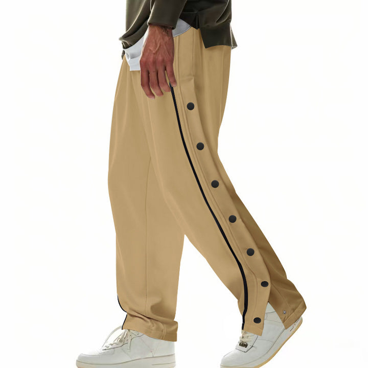 Men's wide training pants with side snap button placket, contrast stripes, elastic waistband, and straight leg StylebySassy